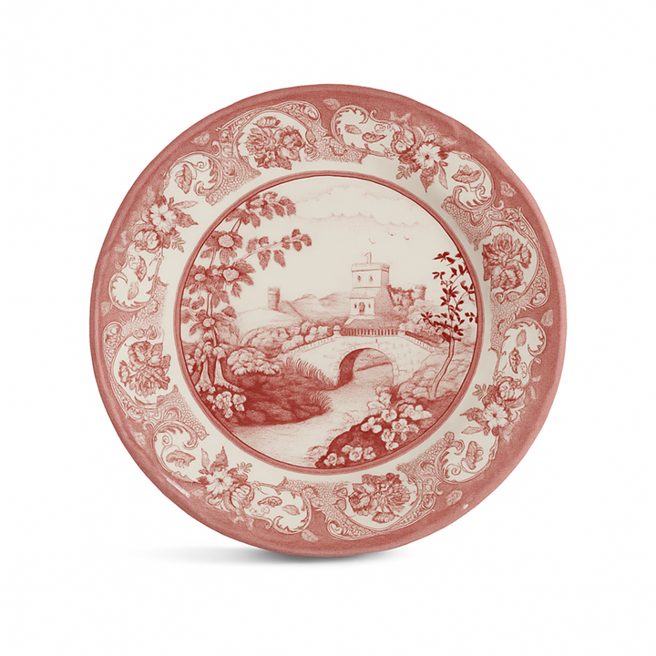 Decorative plate with red and white pattern on a white background