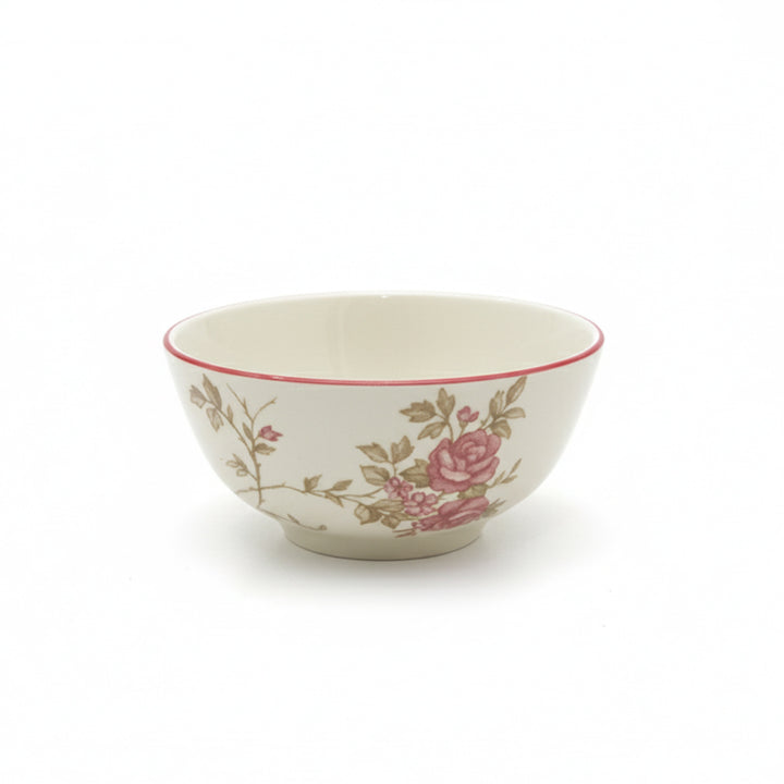 Decorative ceramic bowl with floral patterns on a white background