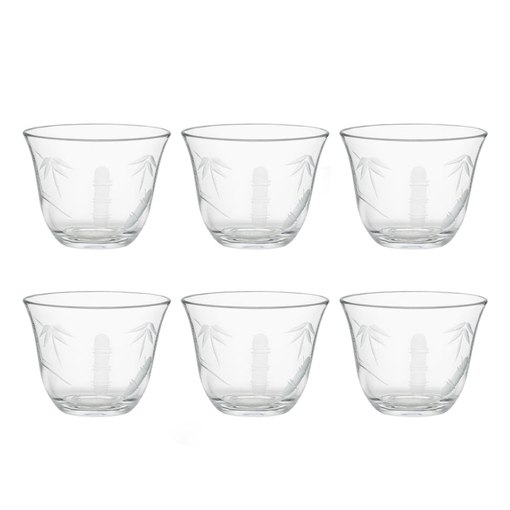 Set of six clear glass tumblers with leaf design on a white background