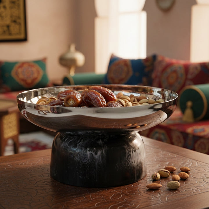 Decorative bowl with nuts on a table in a home setting