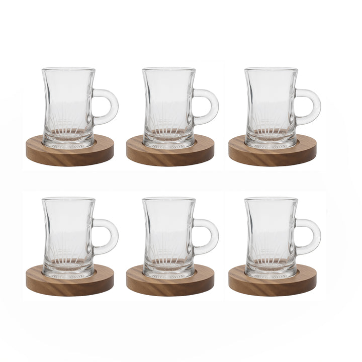 Set of six clear glass mugs with wooden coasters on a white background
