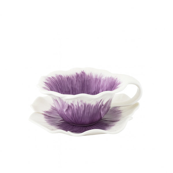 White ceramic bowl with purple floral design on a white background