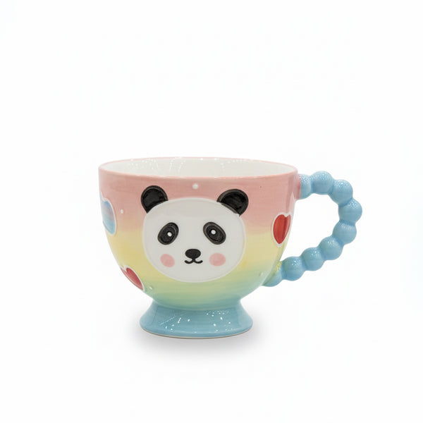 Colorful mug with panda design and blue handle on a white background