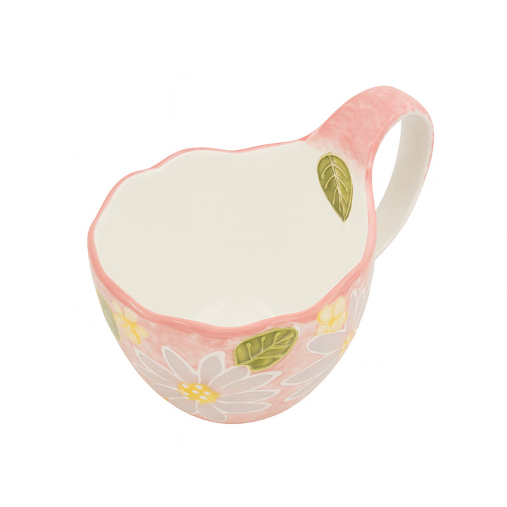Top view of a ceramic cup with a pink floral embossed design, green leaf detailing, and scalloped rim — displayed on a white background from Siddiq Gifts, Mussafah Abu