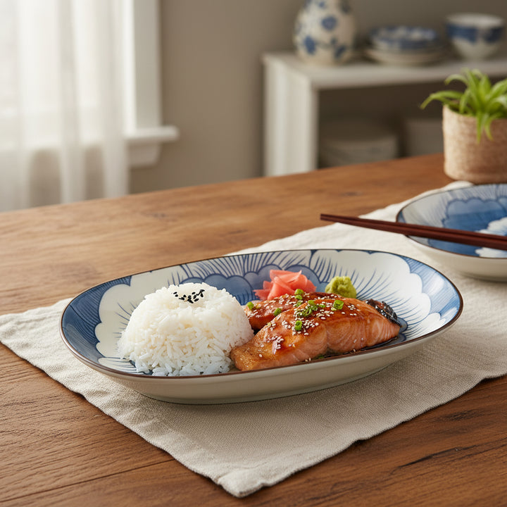 Plated dish of salmon with rice on a wooden table