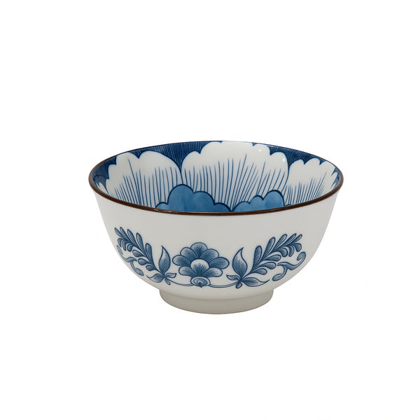 Ceramic bowl with blue floral design on a white background