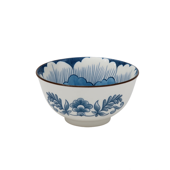 Ceramic bowl with blue floral design on a white background