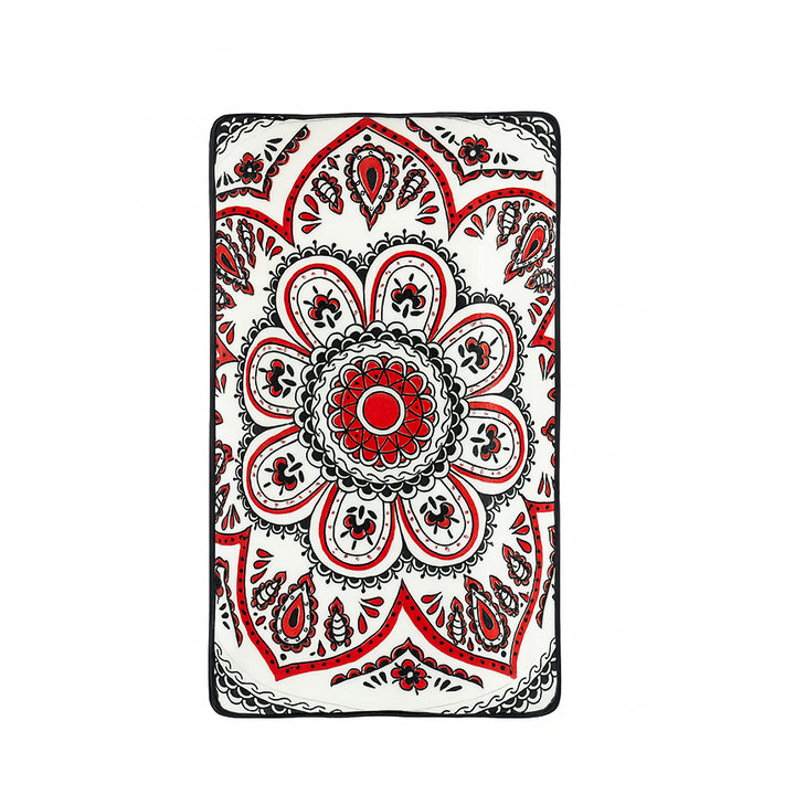 Rectangular card with a red and black floral pattern on a white background
