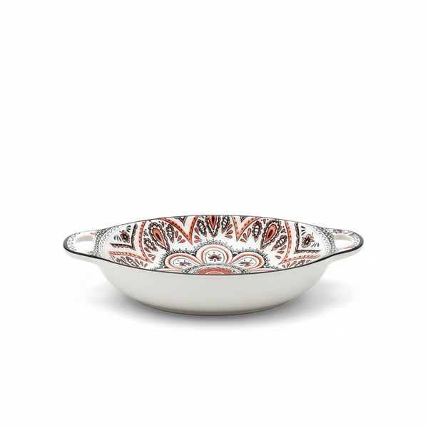 Decorative ceramic bowl with a paisley pattern on a white background