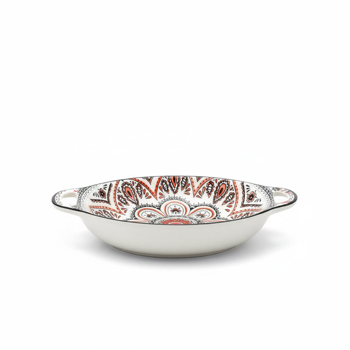 Decorative ceramic bowl with a paisley pattern on a white background