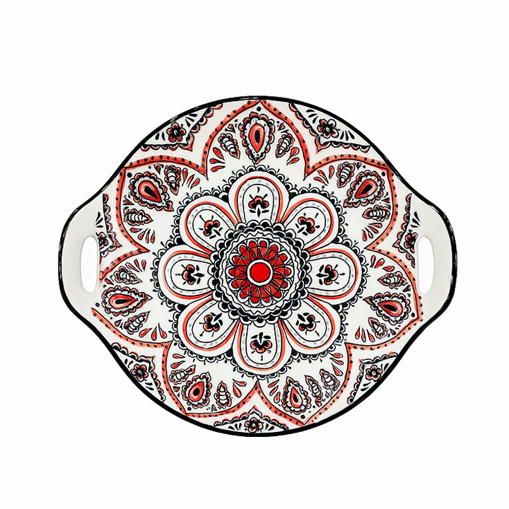 Decorative plate with a mandala design on a white background