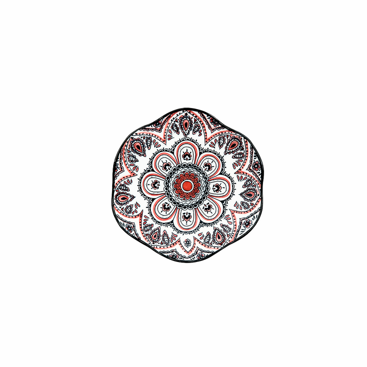 Decorative plate with a mandala design on a white background