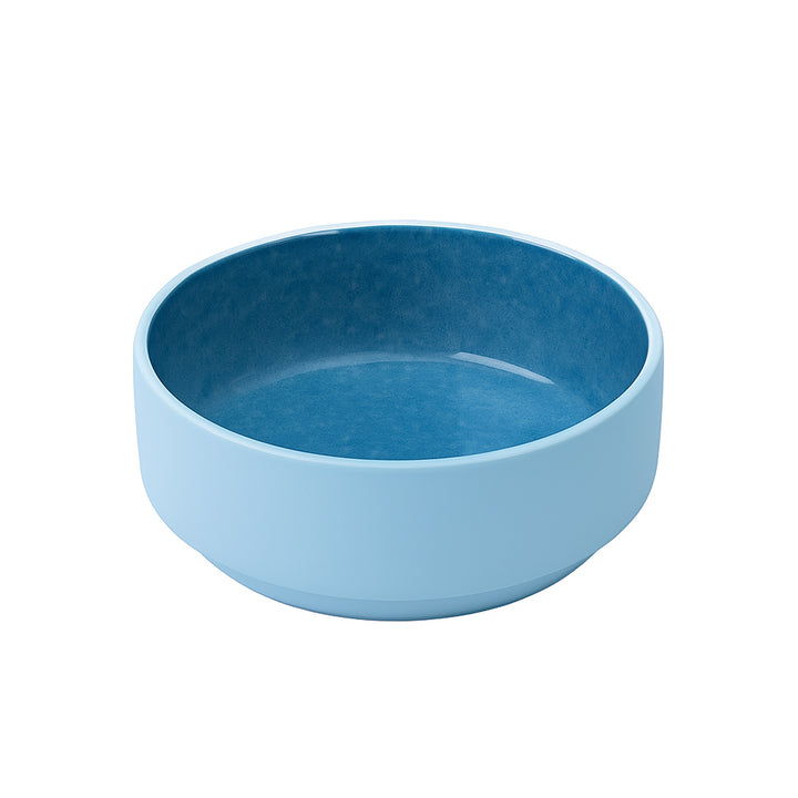 Blue ceramic bowl on a white background
