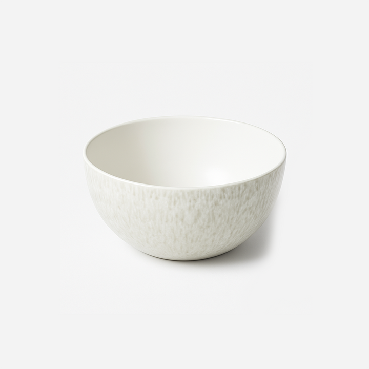 White textured ceramic bowl on a white background