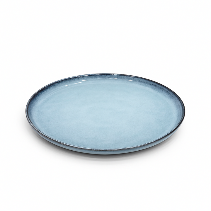 Light blue ceramic plate on a white background