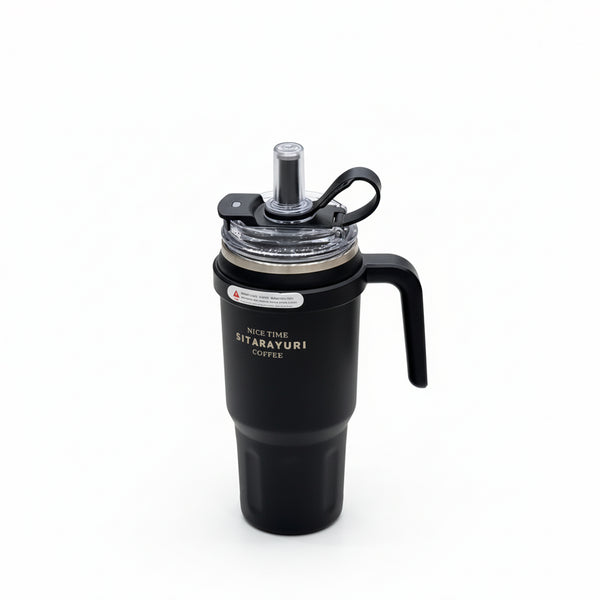 Black coffee maker with a clear lid on a white background