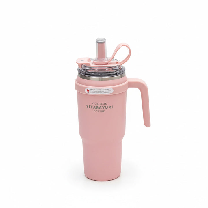 Pink insulated tumbler with handle and straw lid on a white background