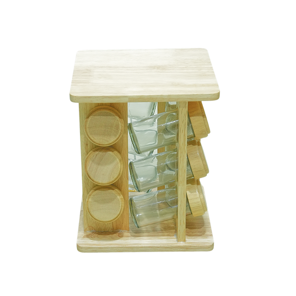 Wooden spice rack with glass containers on a white background
