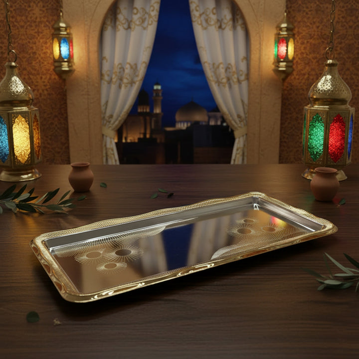 Decorative tray on a table with ornate lamps and curtains in the background