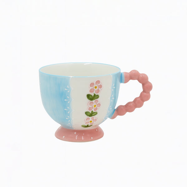 1516-01 Ceramic Mug – Blue & White Floral Design with Pink Handle and Pedestal Base