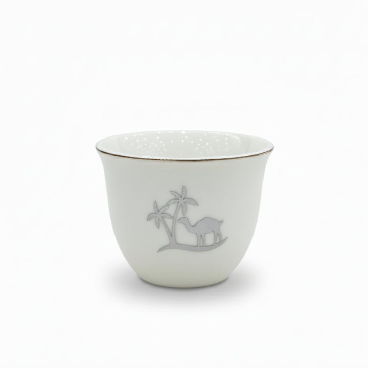 White ceramic cup with a subtle design on a white background