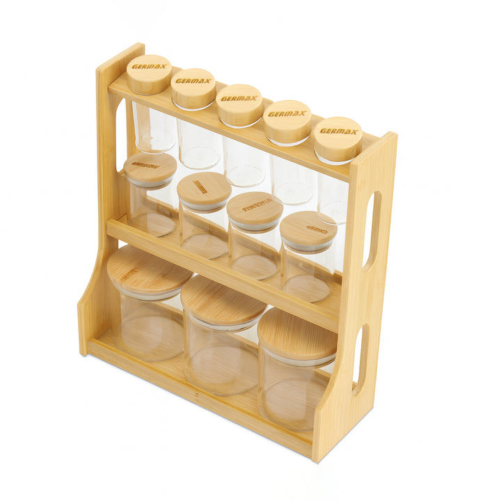 Wooden spice rack with glass jars and wooden lids on a white background