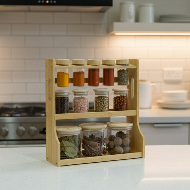Wooden spice rack with jars of spices on a kitchen counter