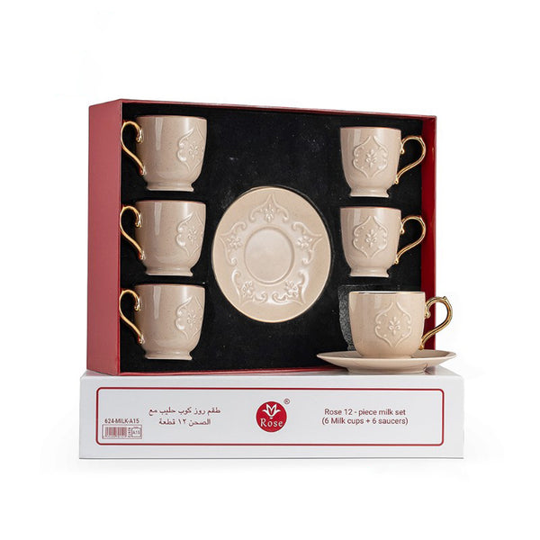 Set of cream-colored milk cups with gold handles and saucers in a decorative box, featuring the Rose brand.