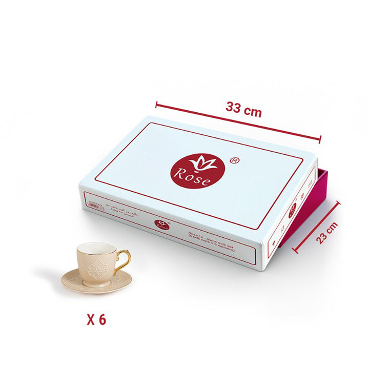 Box with 'Rose' branding and a cup and saucer on a white background