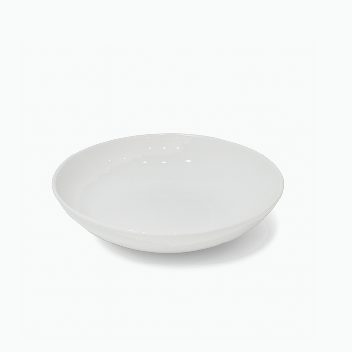 White ceramic bowl on a white background