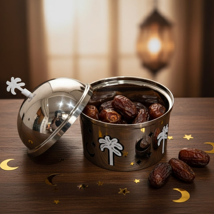 Metal tin with dates on a wooden surface with decorative elements
