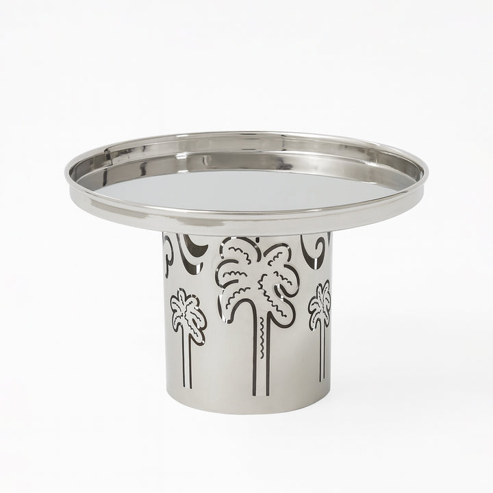 Silver tray with decorative palm tree patterns on a white background