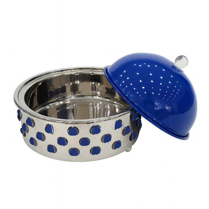 Stainless steel bowl with blue polka dot pattern and matching blue cover on a white background