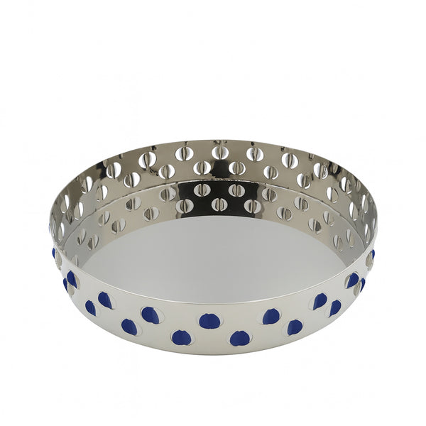 Metal pie crust cutter with blue polka dots on a white background