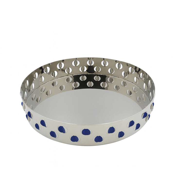 Metal pie crust cutter with blue polka dots on a white background