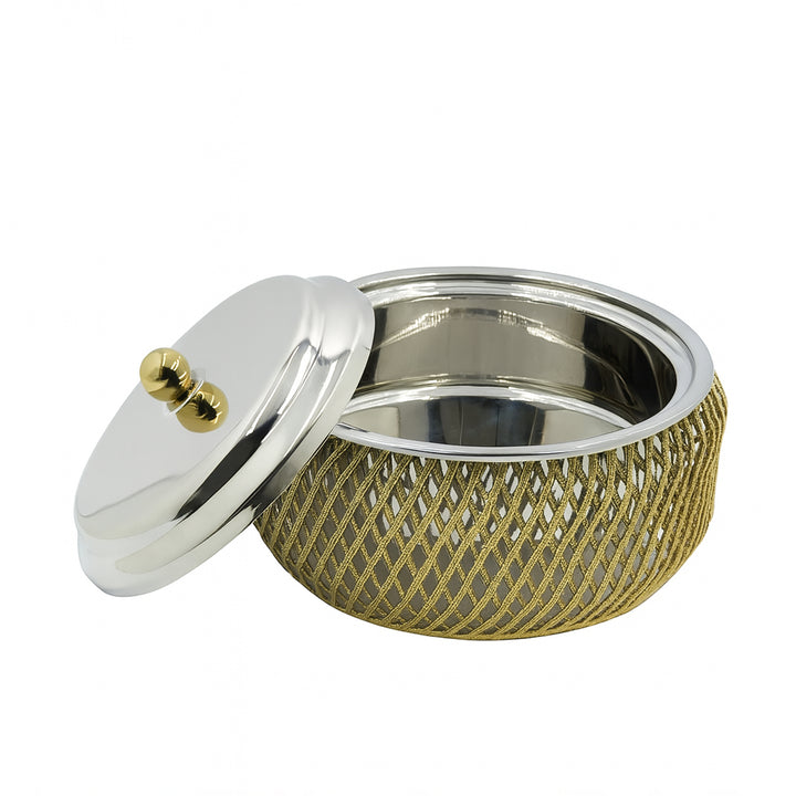 Gold mesh container with silver lid on a white background