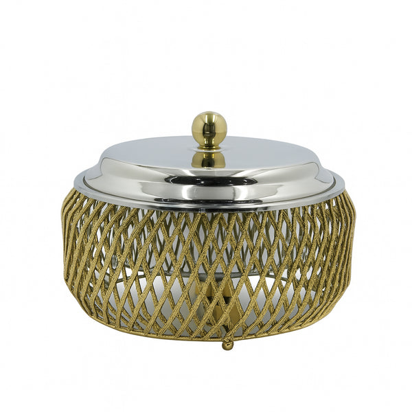 Decorative container with gold mesh base and silver lid on a white background
