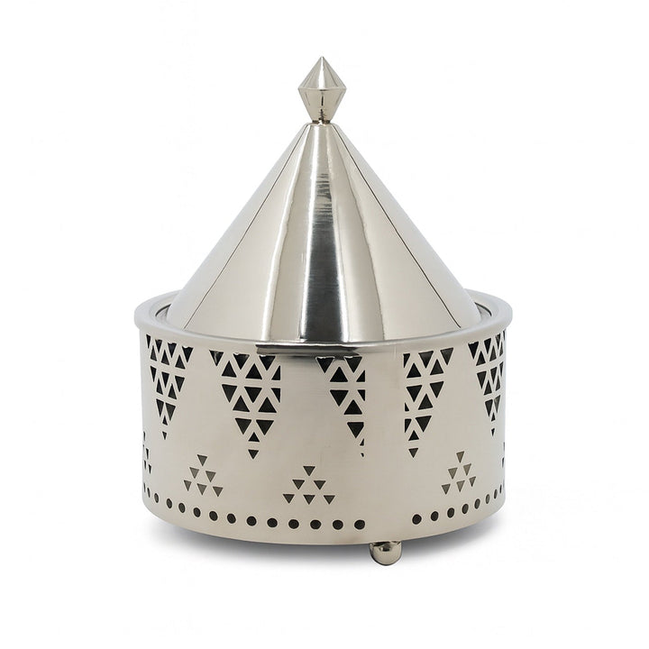 Metallic decorative object with geometric patterns on a white background