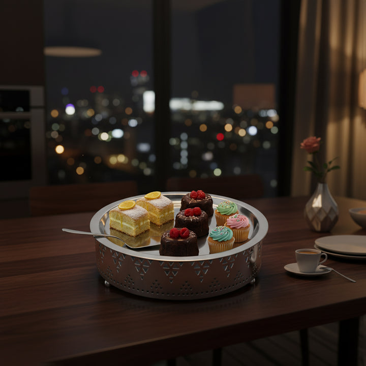 Assorted small cakes on a decorative stand with a cityscape in the background