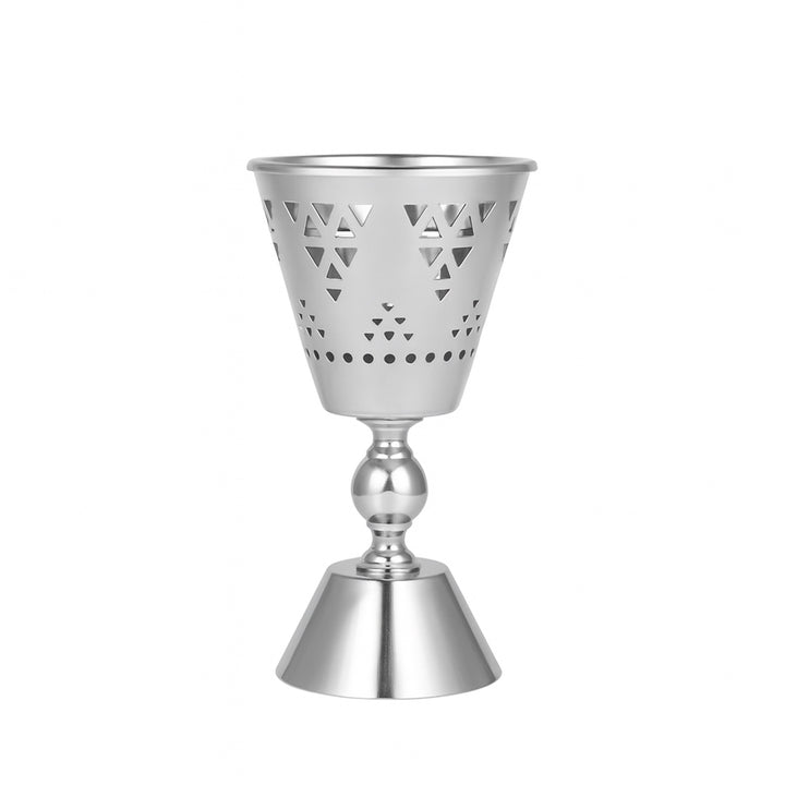 Silver decorative candle holder with geometric design on a white background