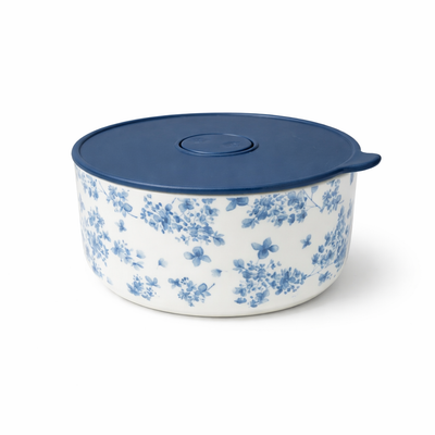 Shop SC4111 ceramic storage bowl 6 inch with lid in white with blue floral design. Ideal for storing leftovers, snacks, salads, and side dishes at home or gatherings. Available at Siddiq Gifts – Mussafah Abu Dhabi.