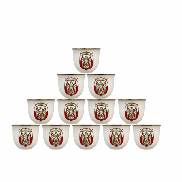 Set of twelve small cups with a red and white design on a white background