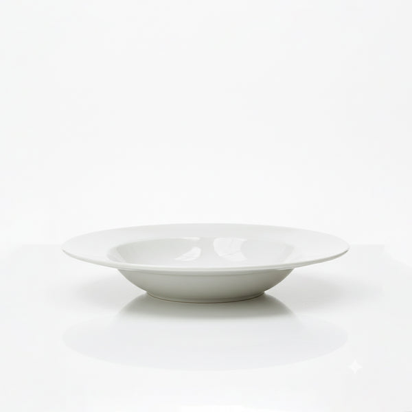 White ceramic bowl on a white background