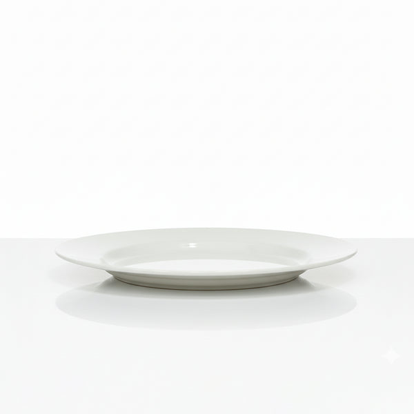 White ceramic plate on a white background