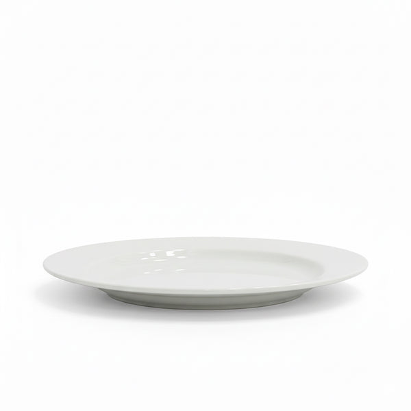 White ceramic plate on a white background