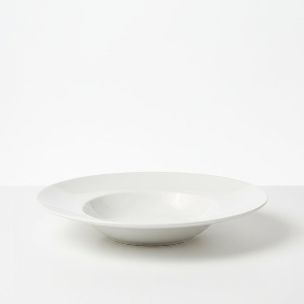 White ceramic bowl on a white background