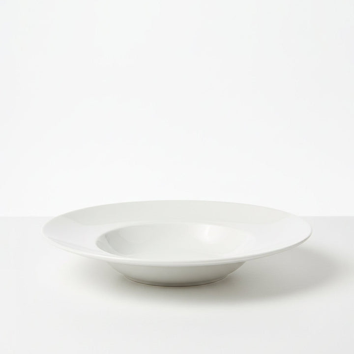 White ceramic bowl on a white background