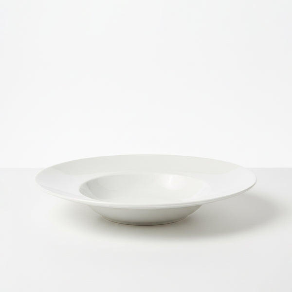 White ceramic bowl on a white background