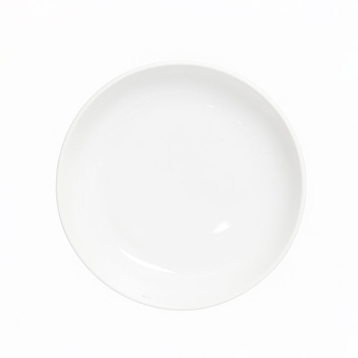 White ceramic plate on a white background