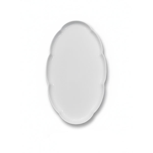 White ceramic plate on a white background